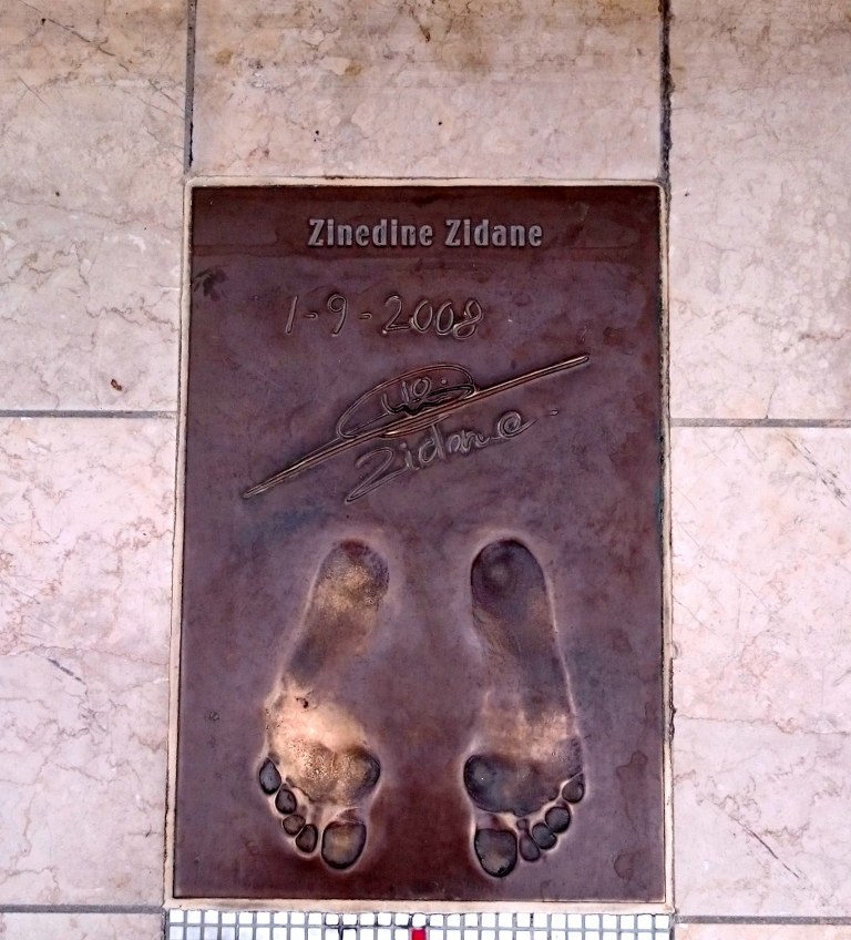 a_brass_footprint_of_a_famous_french_football_player