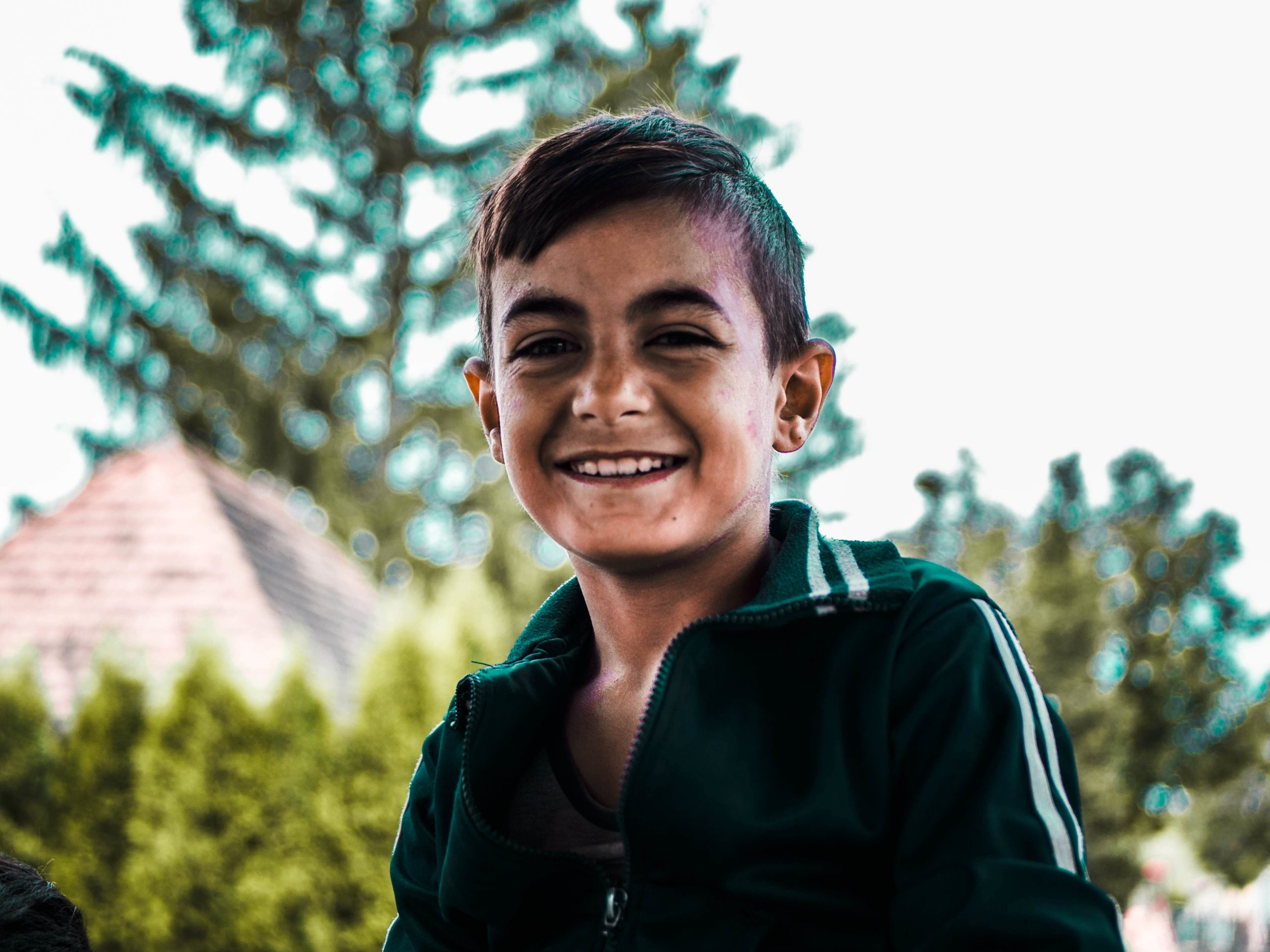 smiling-boy-posing-in-front-of-camera