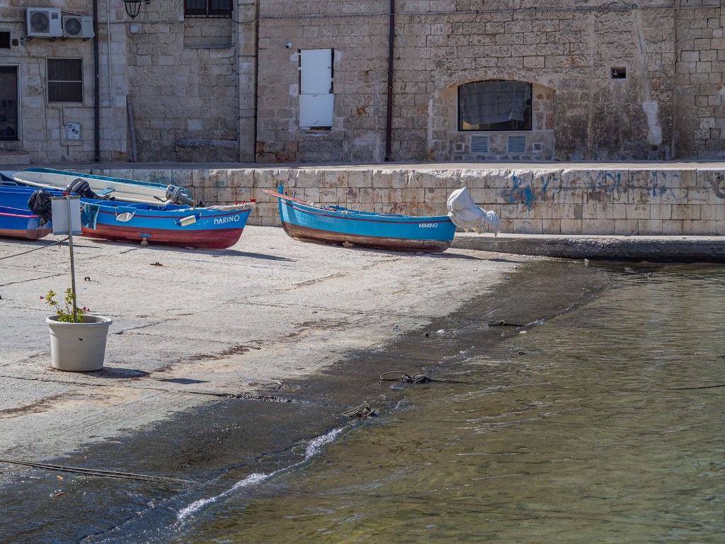 a_piece_of_old_harbour_in_monopoli_in_puglia_in_italy