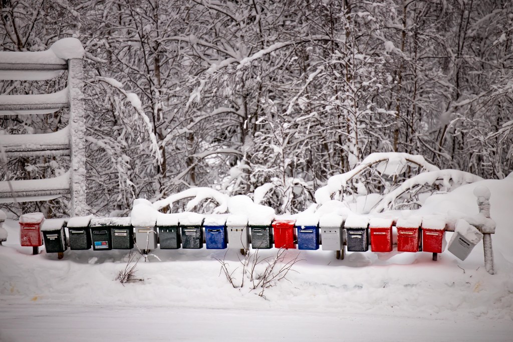 colourful_postboxes_covered_with_high_snow